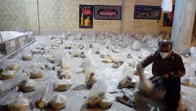 توزيع بيش از 400 بسته مواد غذايي در بين نيازمندان شهر ياسوج